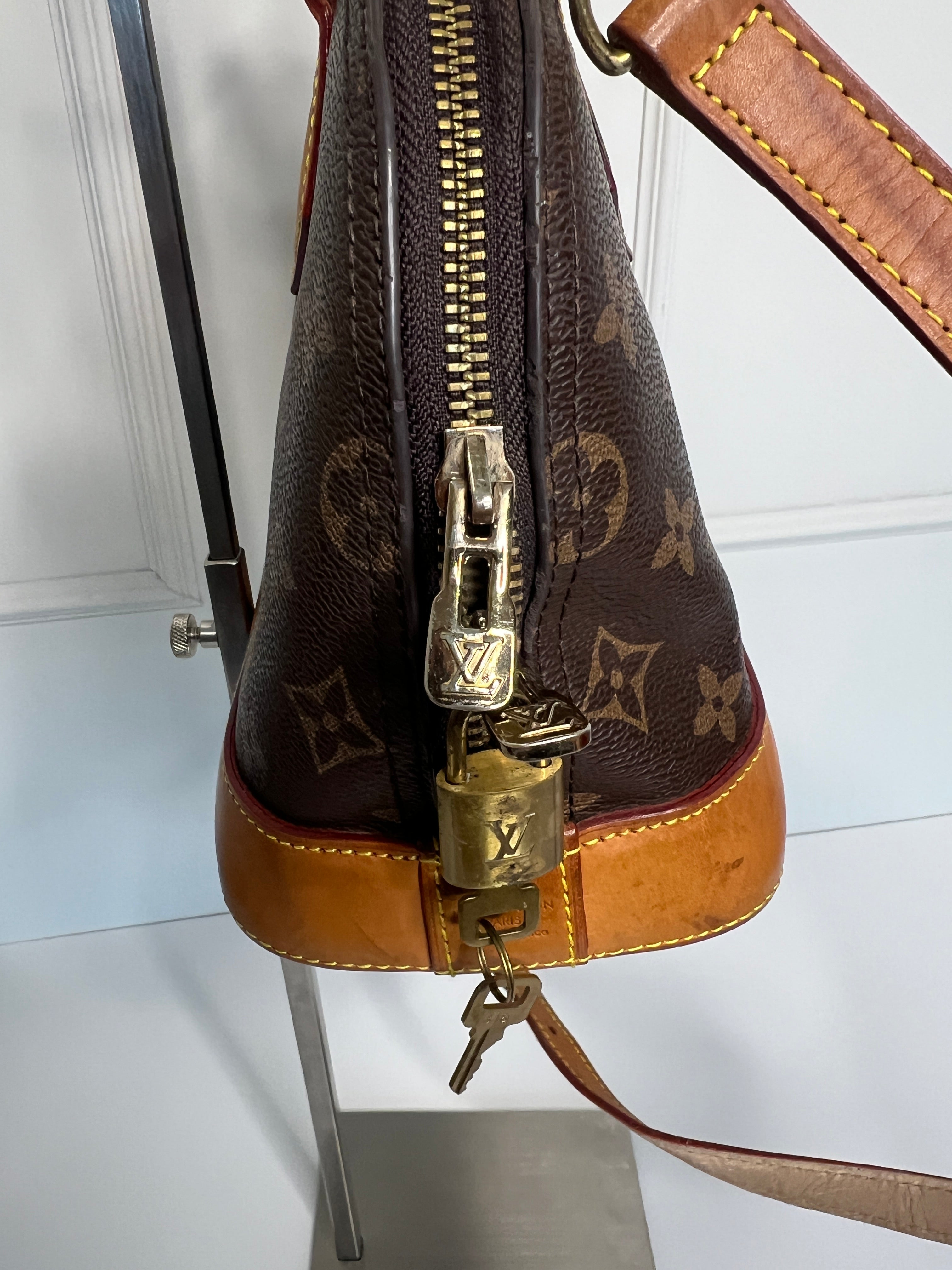 Louis Vuitton Alma BB met schouderriem
