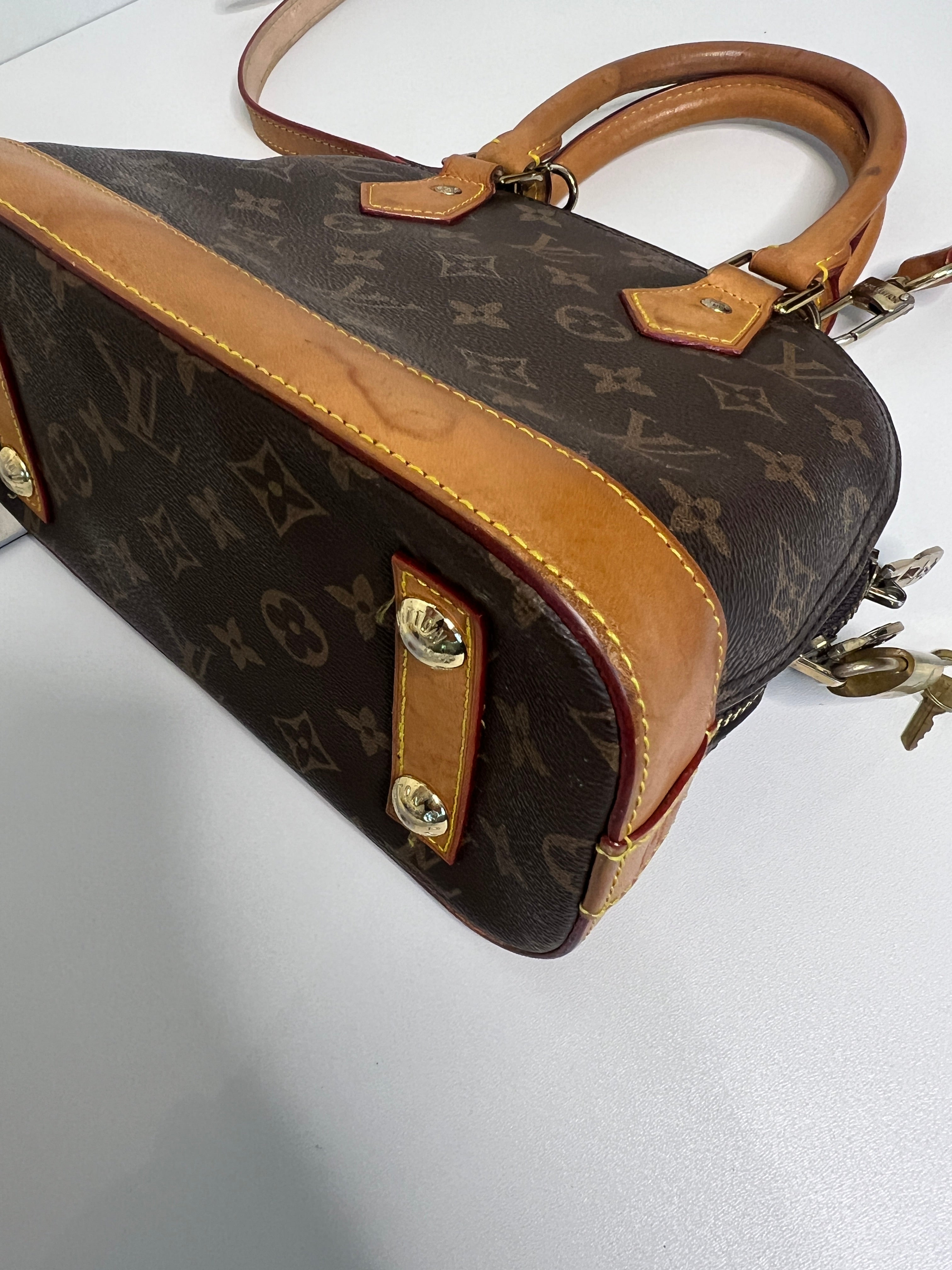 Louis Vuitton Alma BB met schouderriem